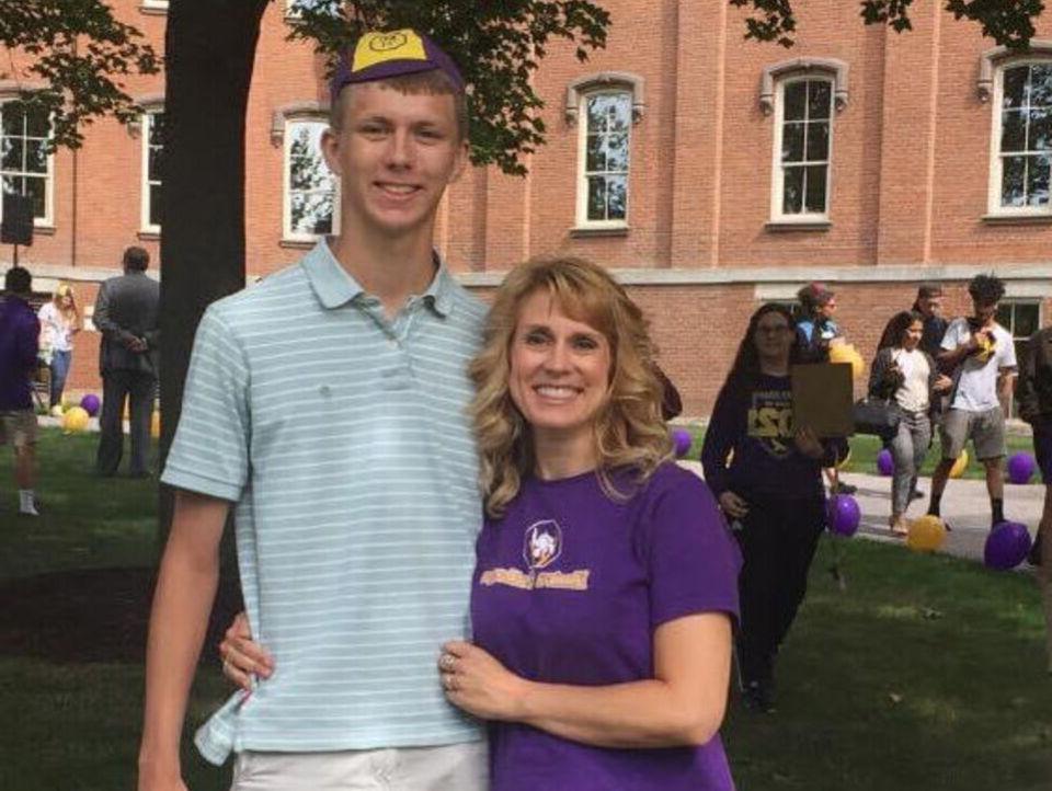 - Wendy Slater '93, MSEd '98 stands with son Zackarie Stedge '21 on the lawn outside of Cowles Hall